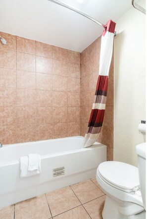 Premium Room, 1 King Bed, Kitchenette | Bathroom | Free toiletries, hair dryer, towels