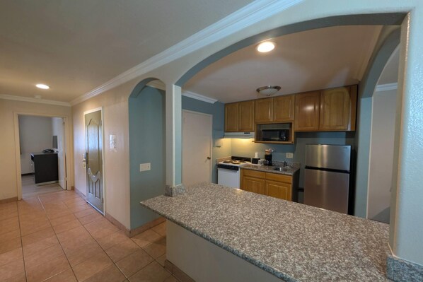 Suite, 1 Bedroom, Non Smoking | In-room safe, desk, blackout drapes, iron/ironing board