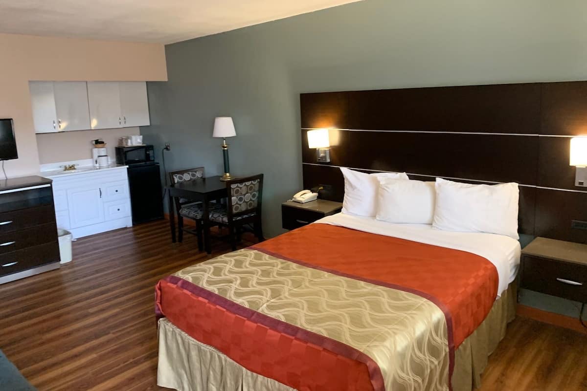 Traditional Suite, 2 Bedrooms | In-room safe, desk, blackout drapes, iron/ironing board