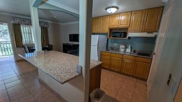 Suite, Multiple Beds, Non Smoking | In-room safe, desk, blackout curtains, iron/ironing board