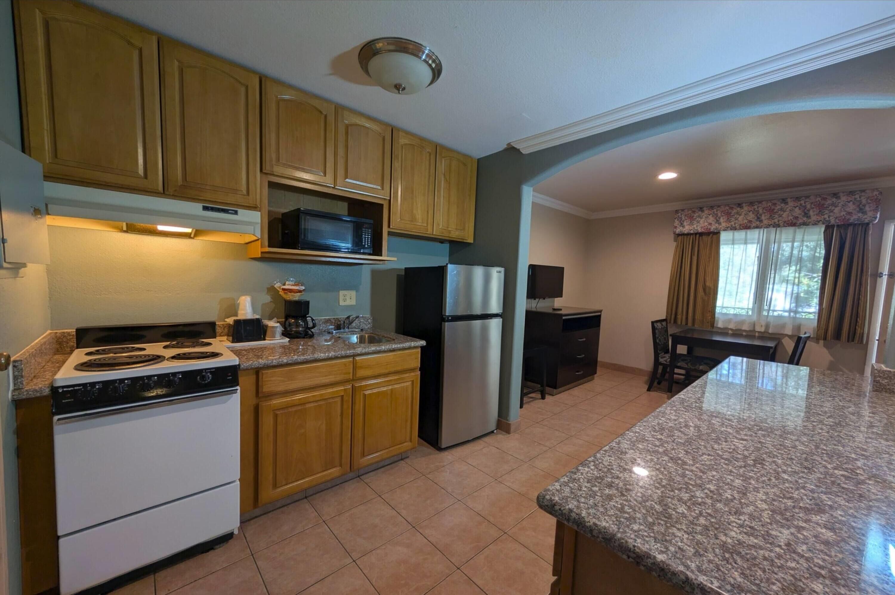 Suite, 1 Bedroom, Non Smoking | In-room safe, desk, blackout drapes, iron/ironing board