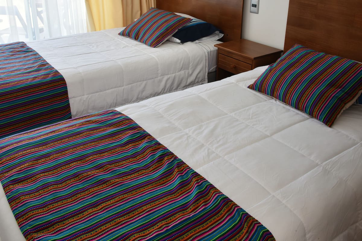 Departamento familiar, varias camas | Ropa de cama de alta calidad y caja de seguridad en la habitación