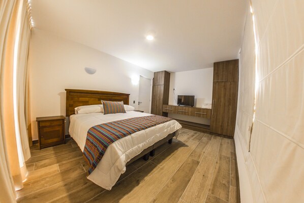 Apartamento standard, 1 cama King e sofá-cama | Roupas de cama premium, cofres nos quartos