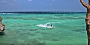 On the beach, white sand, beach towels