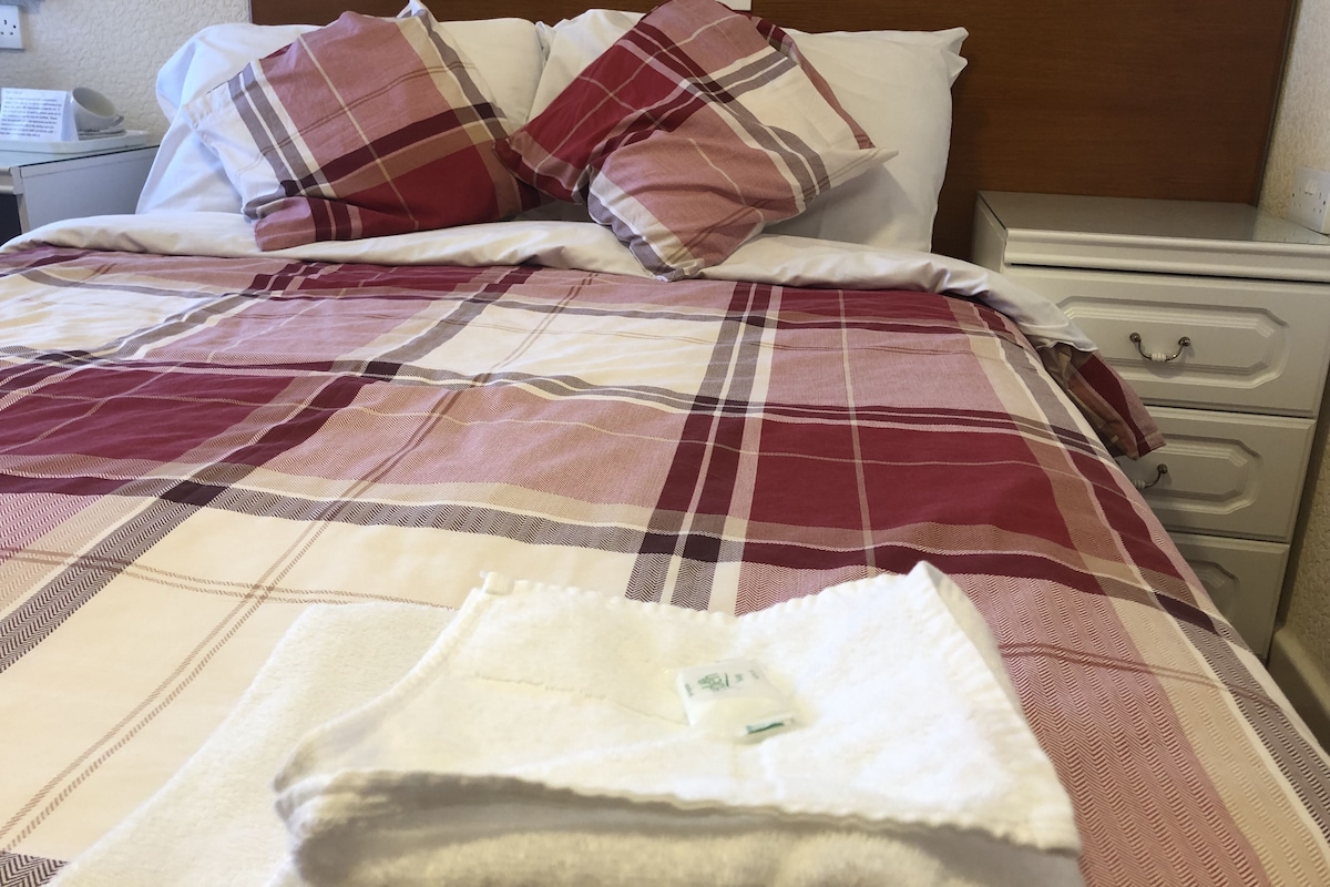 Desk, iron/ironing board (on request), bed sheets