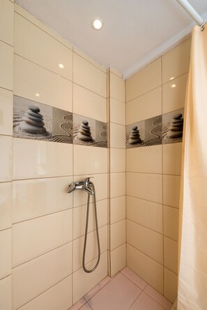 Comfort Studio Suite, Multiple Beds, Kitchenette, City View | Bathroom | Shower, free toiletries, hair dryer, bathrobes - Suite Mantilaria (Santorini)
