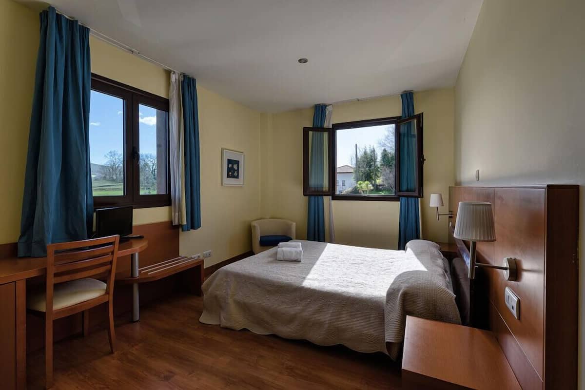 Desk, free WiFi, bed sheets