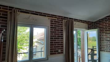 Room, Balcony, Pool View | 1 bedroom, minibar, individually decorated, individually furnished