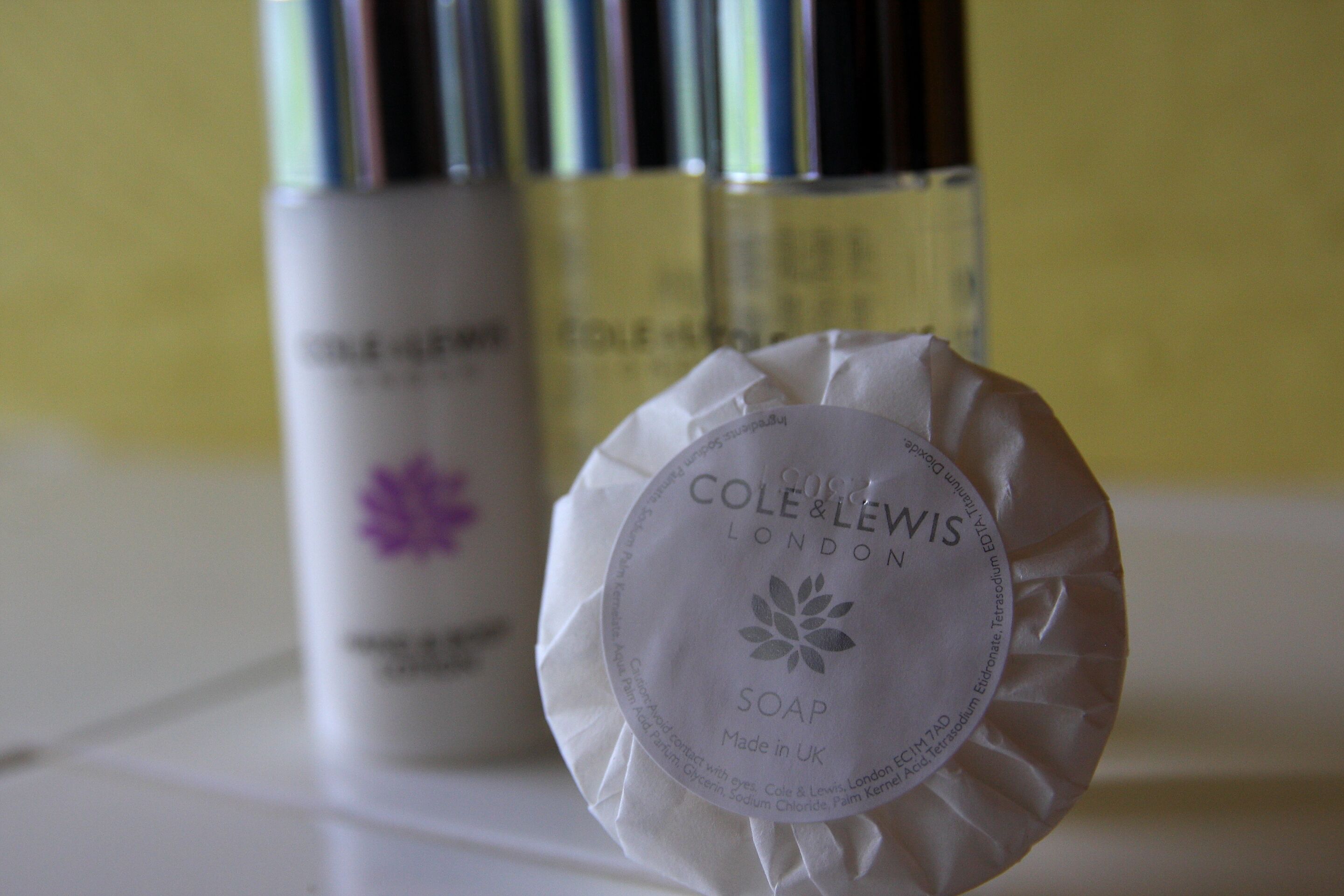 A bottle of Cole & Lewis London soap with a label indicating it is made in the UK.