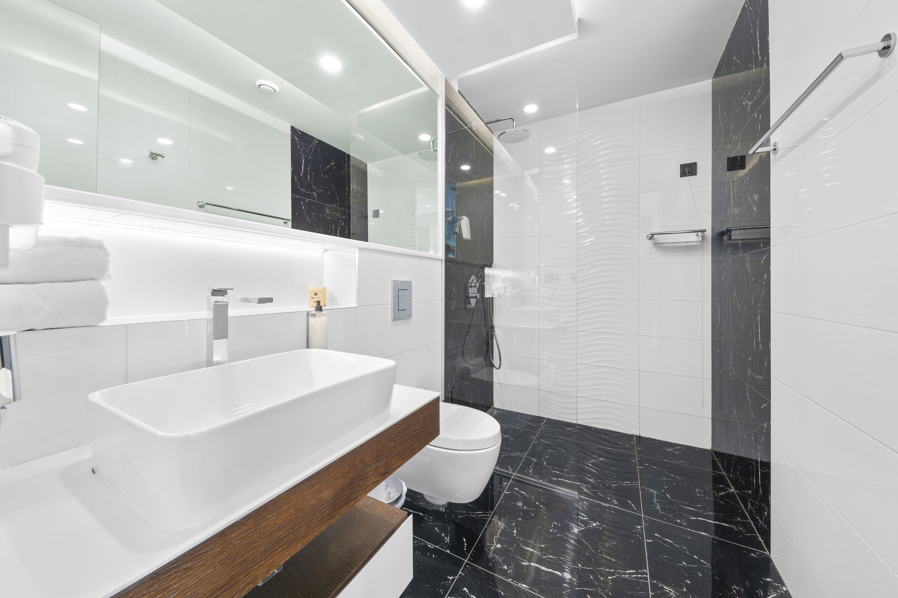 shower, free toiletries, hair dryer, towels