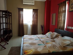 Deluxe Suite, 1 Bedroom | Individually decorated, individually furnished, laptop workspace - Neila Hôtel Résidence (Sèmè-Kpodji)