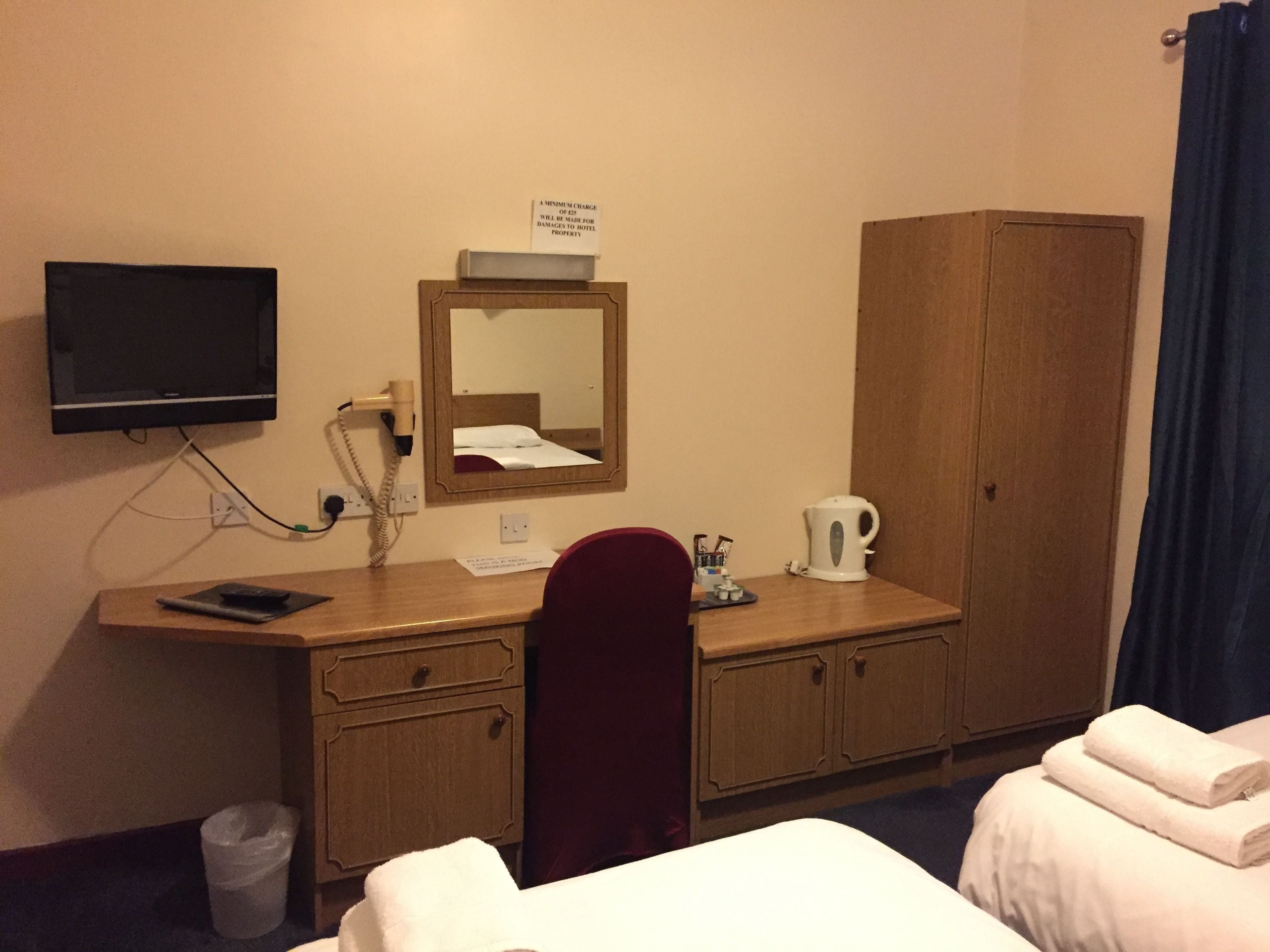 blackout curtains, iron/ironing board, free wifi, bed sheets