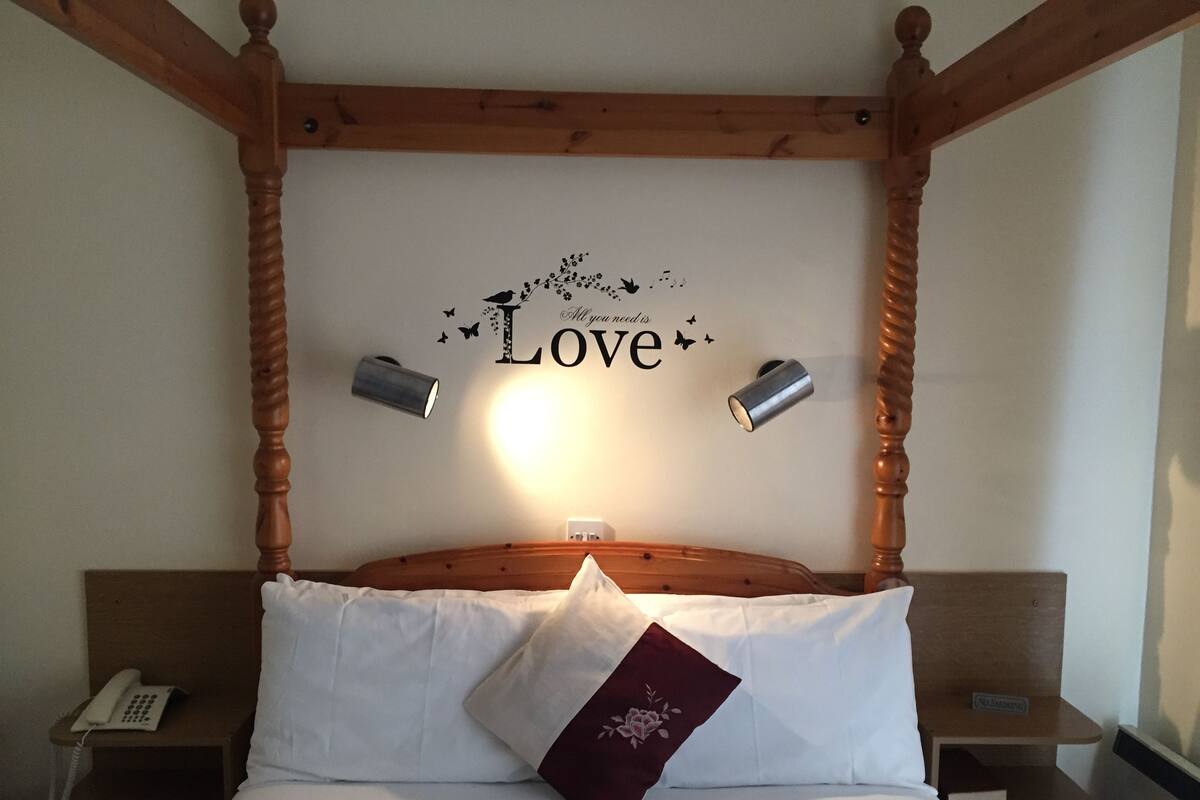 blackout curtains, iron/ironing board, free wifi, bed sheets