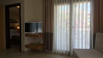 Apartment, 1 Bedroom | Living area | LCD TV