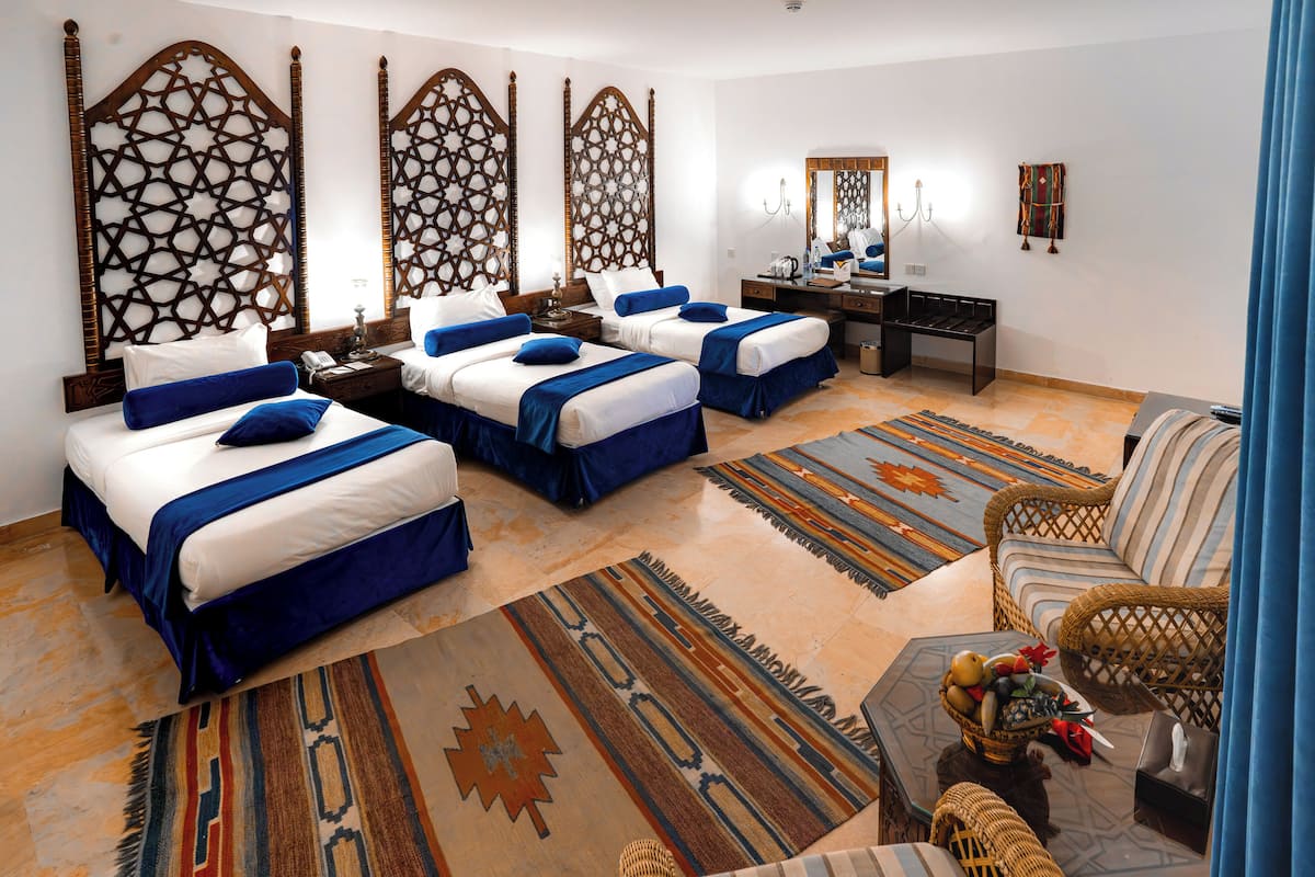 Habitación triple estándar | Artículos del minibar gratis y caja de seguridad en la habitación