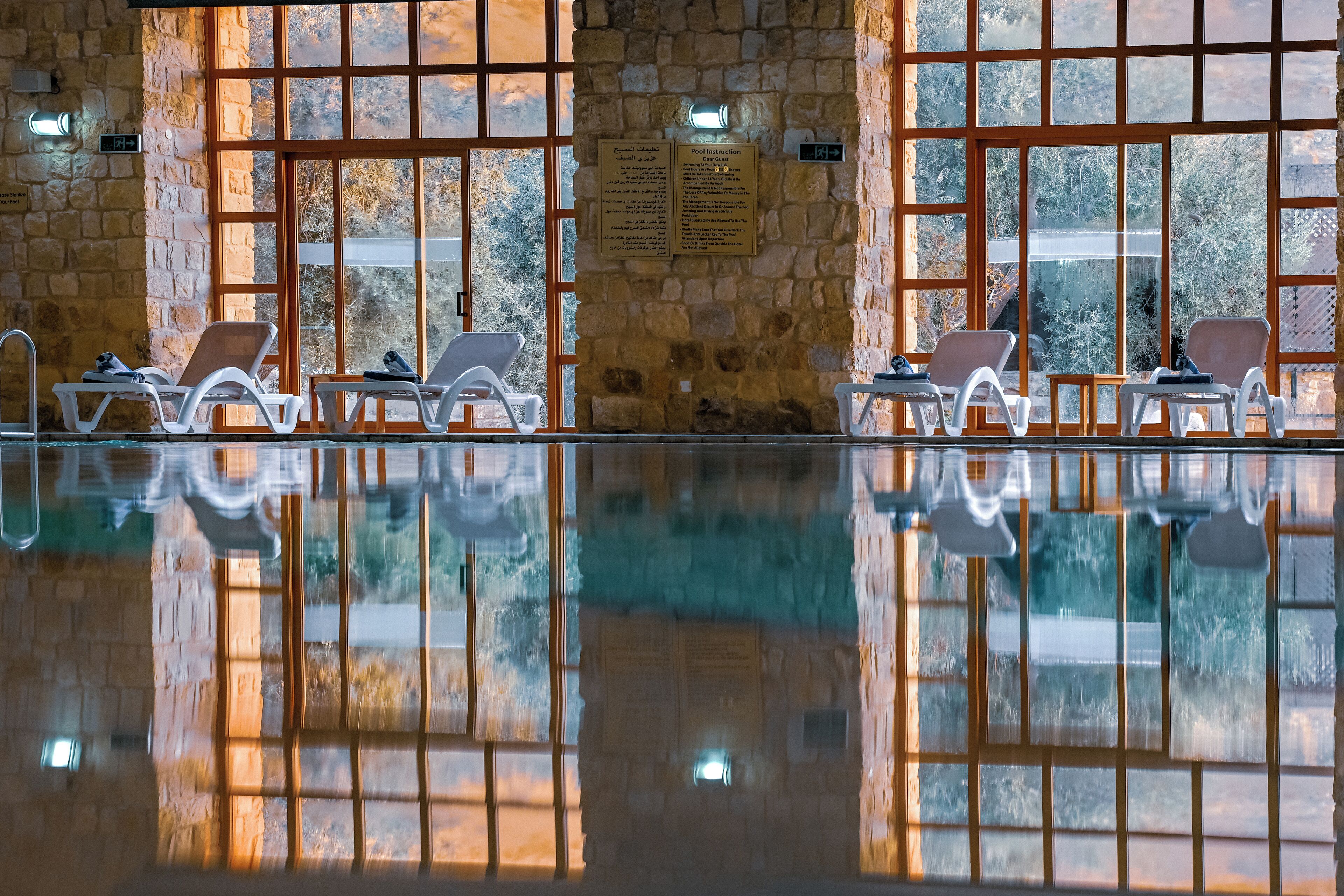 Indoor pool, seasonal outdoor pool, open 6 AM to 9:00 PM, pool umbrellas