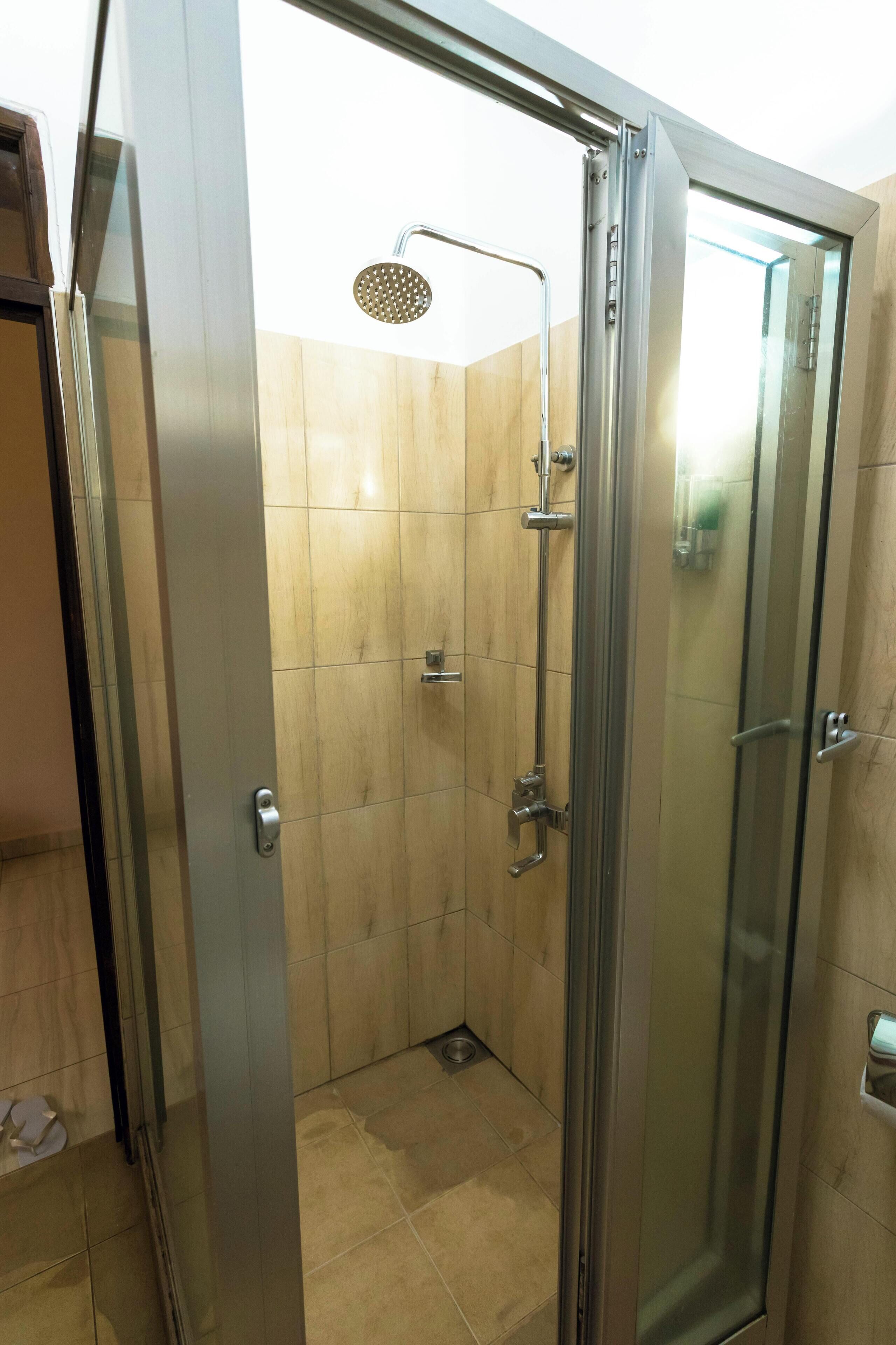 premium room | bathroom amenities | shower, free toiletries, hair dryer, towels