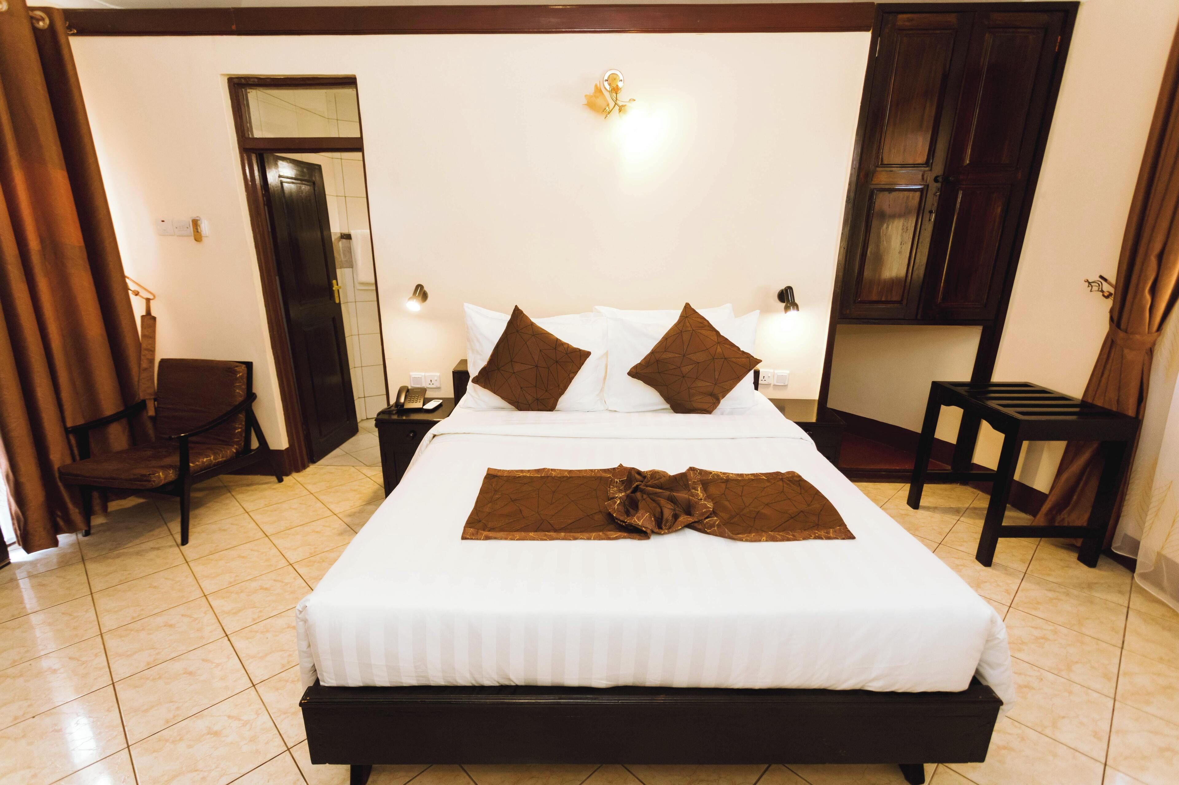 Ropa de cama de alta calidad y minibar 