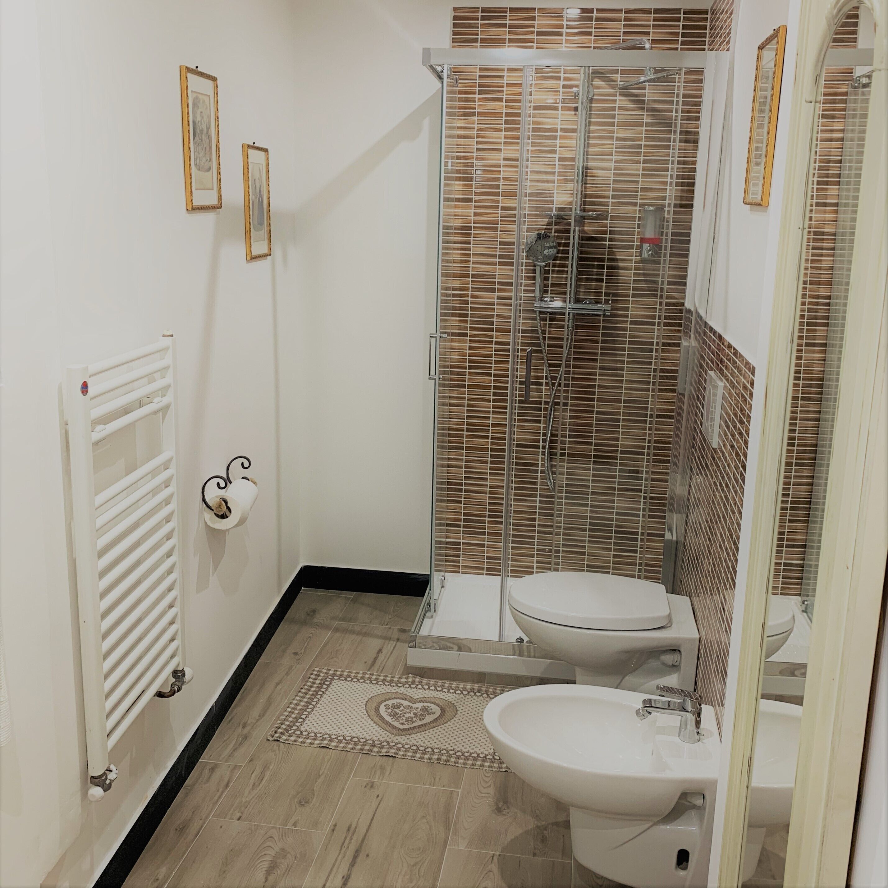 Family Triple Room, Multiple Beds | Bathroom | Shower, free toiletries, hair dryer, bathrobes