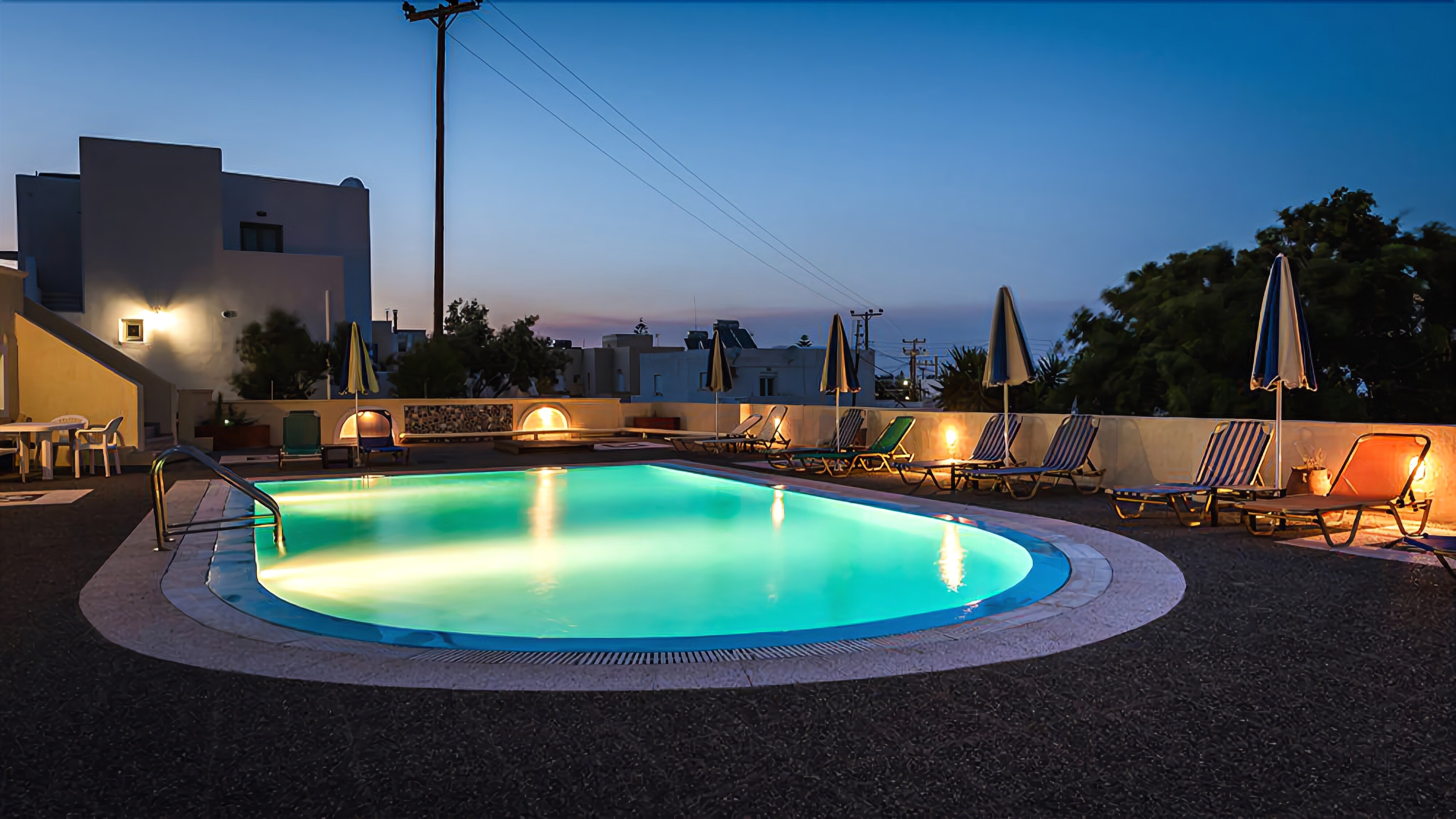 outdoor pool, pool umbrellas, pool loungers