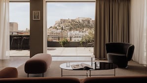 A modern room with a view of a historic hilltop fortress. - Perianth Hotel, a member of Design Hotels (Athens)