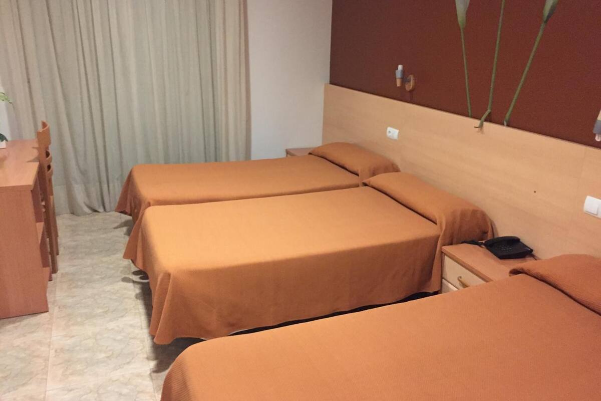 desk, blackout curtains, free wifi, bed sheets