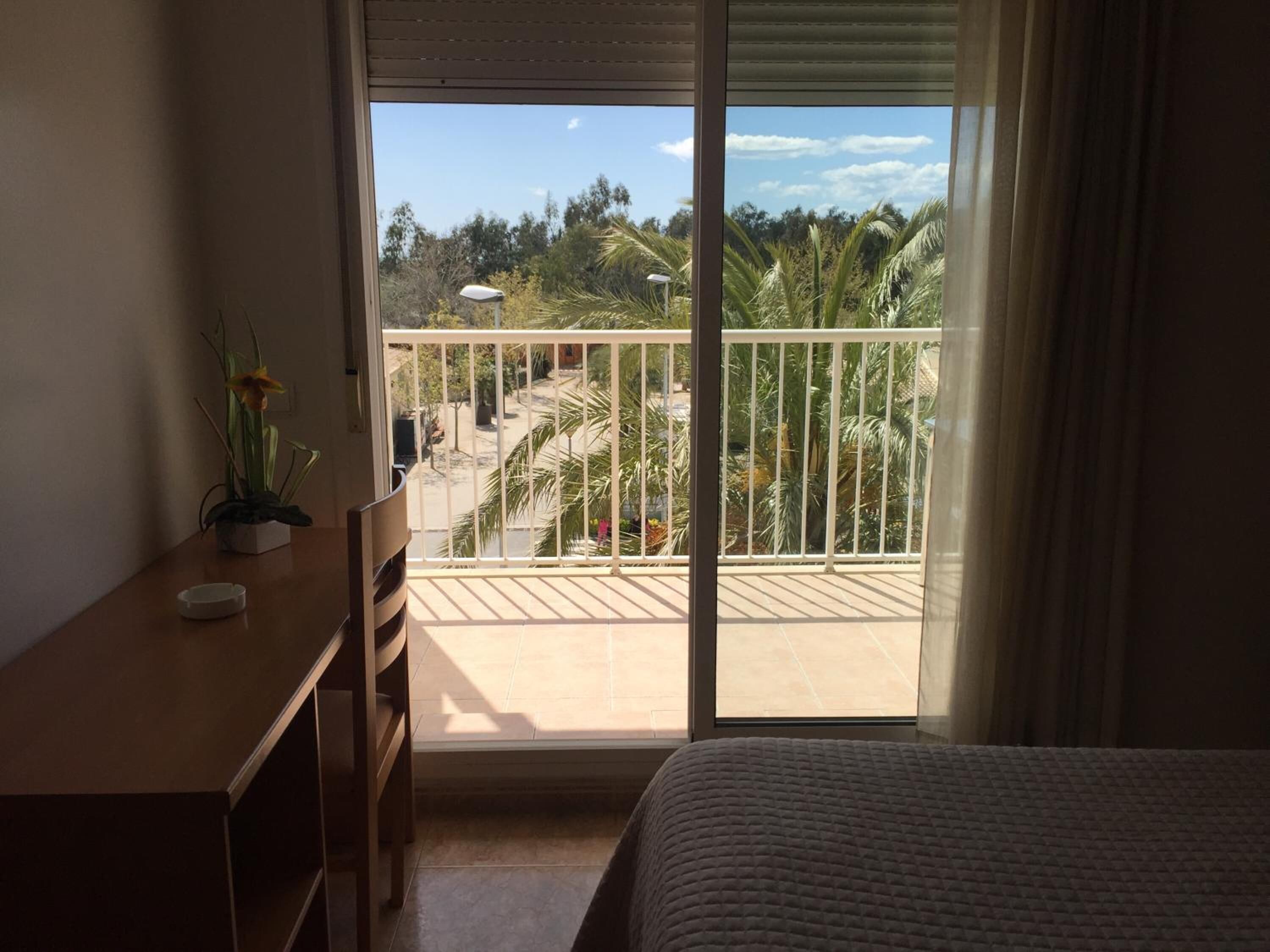 desk, blackout curtains, free wifi, bed sheets