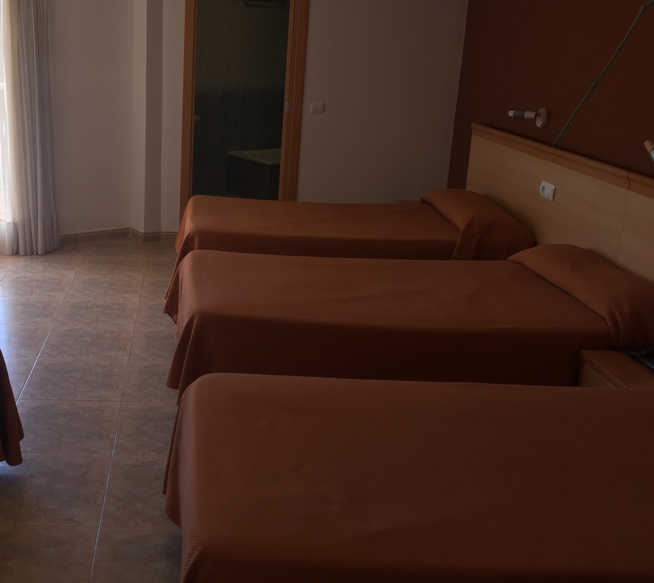 desk, blackout curtains, free wifi, bed sheets