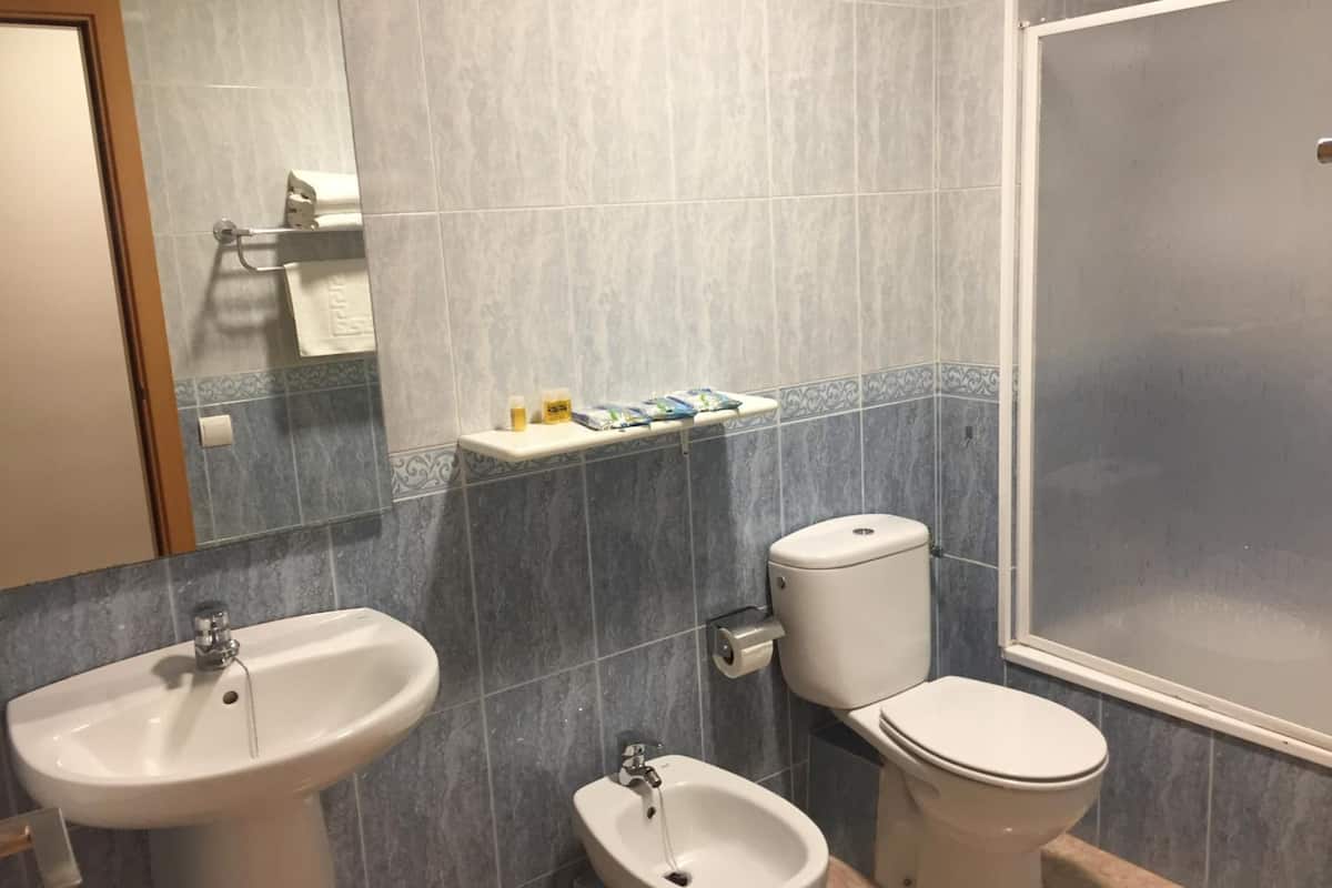 bathtub, free toiletries, hair dryer, bidet