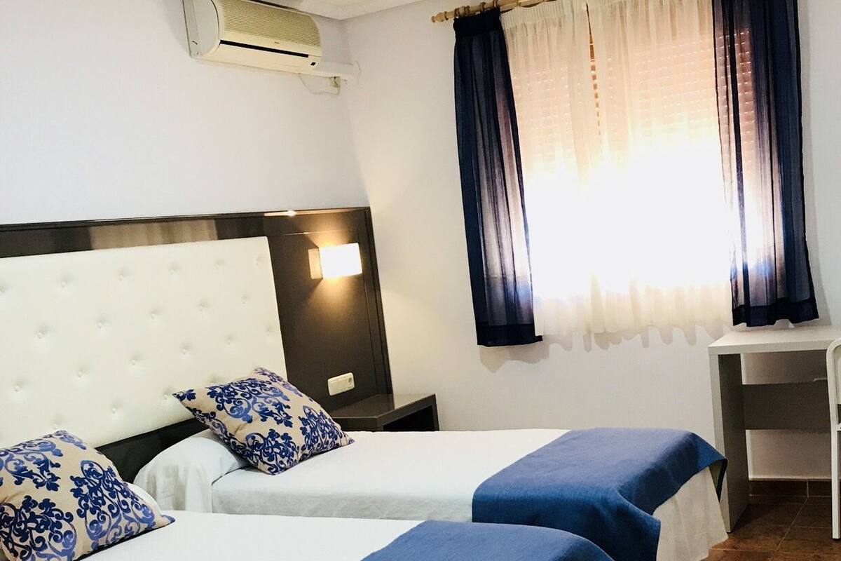 Twin Room | Desk, blackout curtains, free WiFi, bed sheets