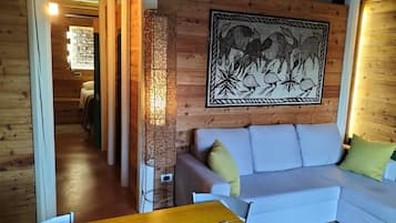 Suite familiar, 2 habitaciones, para no fumadores, vista al jardín | 1 habitación, minibar, decoración personalizada y muebles diferentes