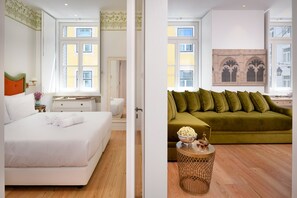 Deluxe Apartment, 1 Bedroom | Living area | 32-inch flat-screen TV with cable channels, TV, toys - Residentas Aurea (Lisbon)