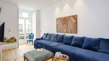 32-inch flat-screen TV with cable channels, TV, toys