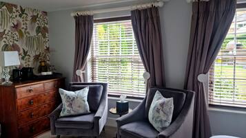 Superior Double Room, Garden View | Individually decorated, individually furnished, desk, iron/ironing board