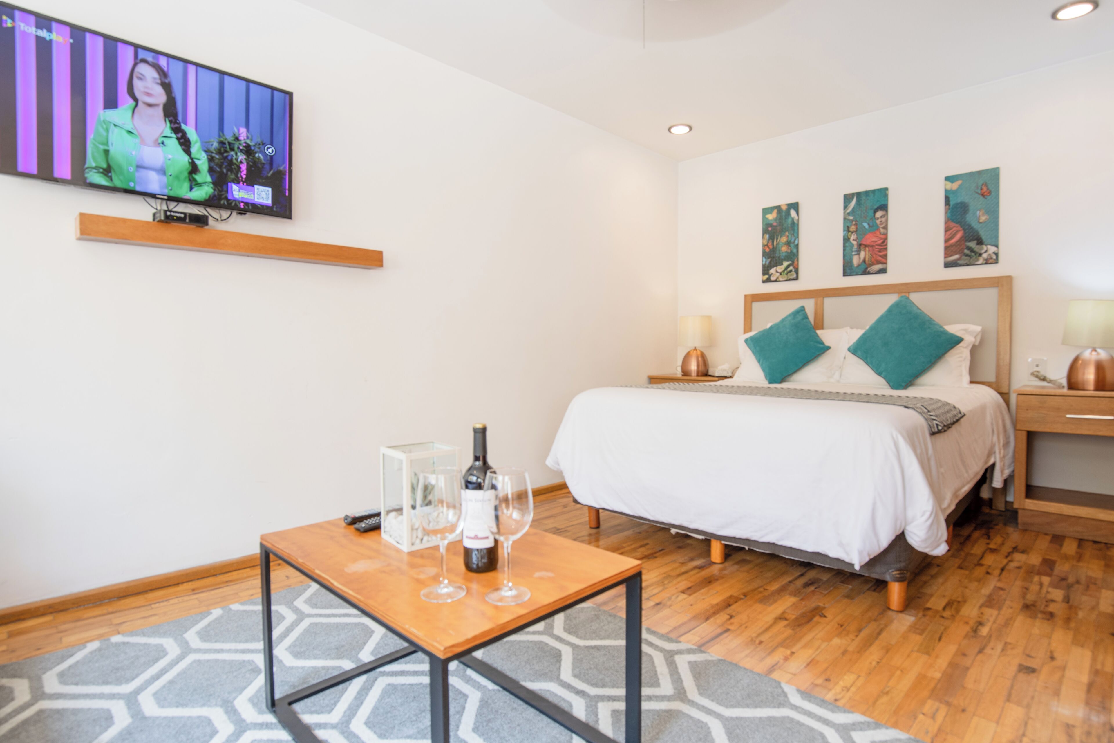 Departamento superior | Ropa de cama de alta calidad, camas con pillow-top y minibar 