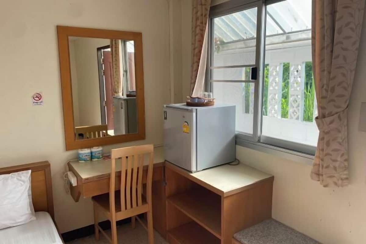 Desk, blackout curtains, free WiFi, bed sheets