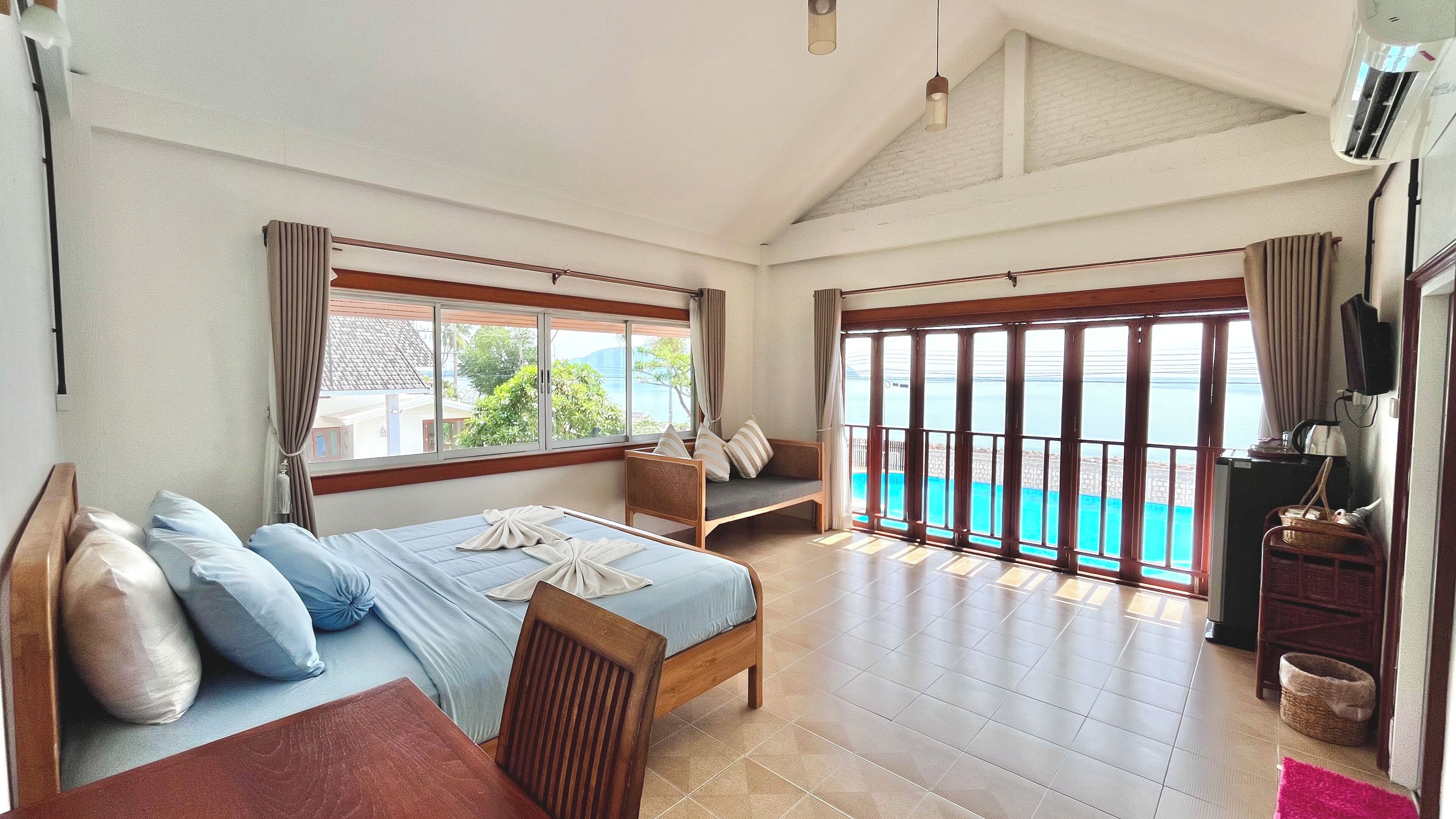 Habitación Premium, vista al mar | Escritorio, cortinas blackout, wifi gratis y ropa de cama 