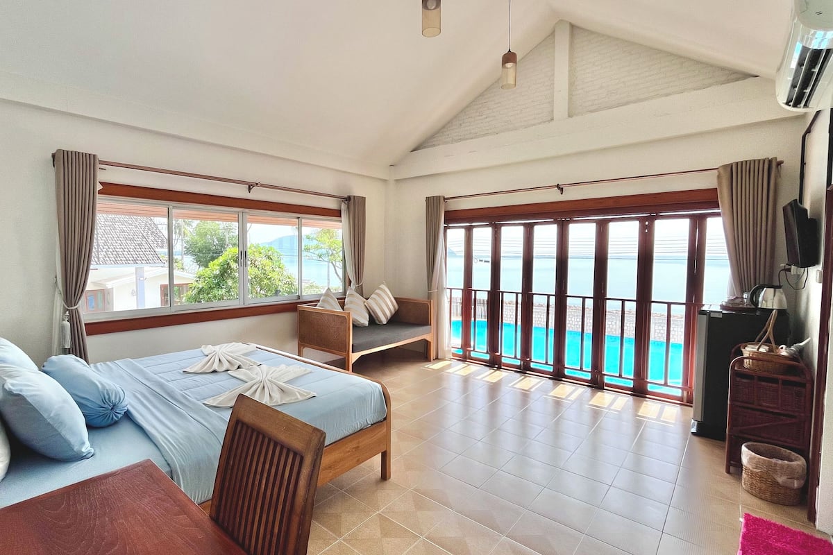 Habitación Premium, vista al mar | Escritorio, cortinas blackout, wifi gratis y ropa de cama