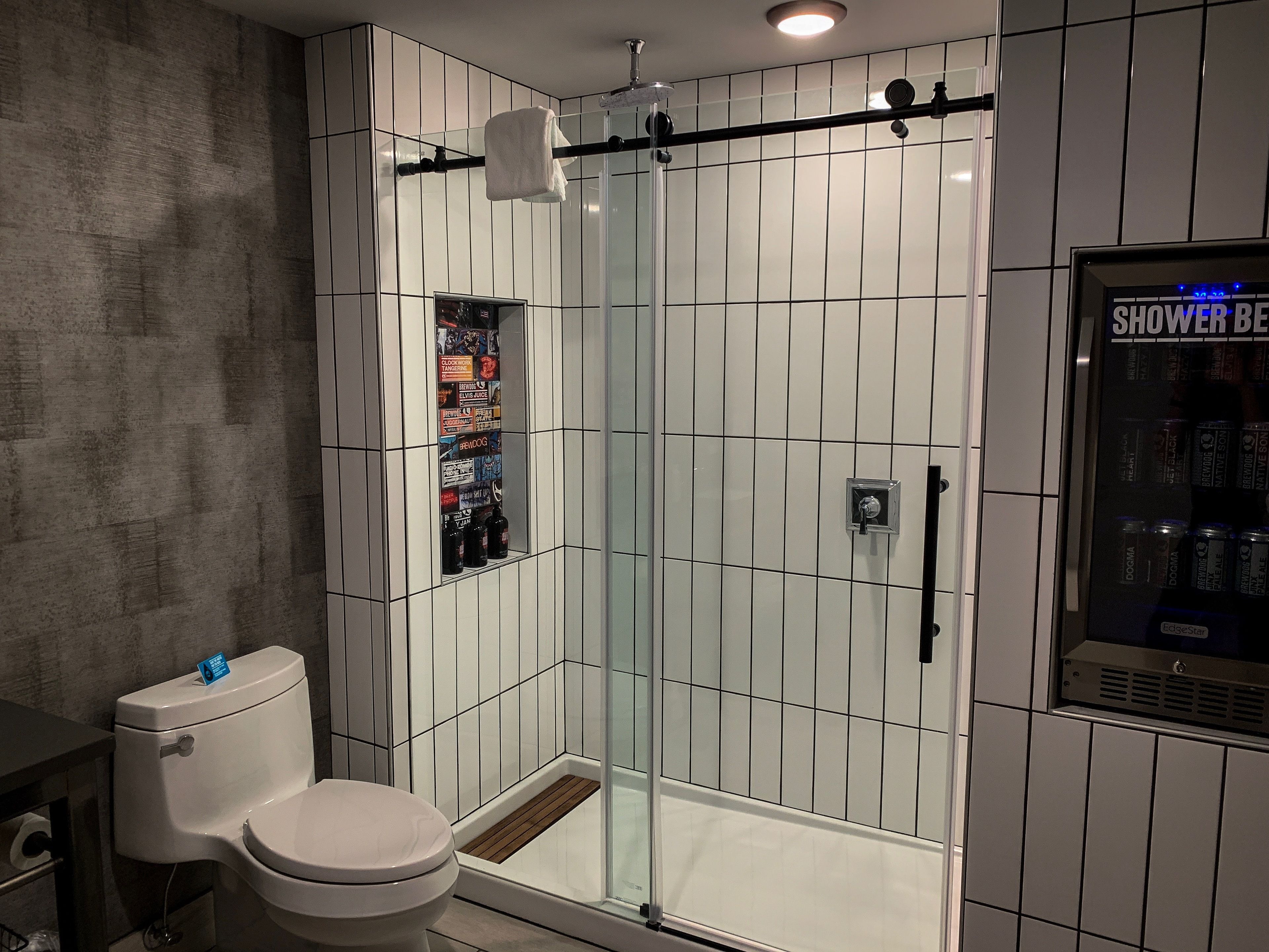 brewmaster suite, non-dog friendly | bathroom | shower, rainfall showerhead, hair dryer, slippers