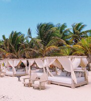 Private beach, white sand, free beach cabanas, sun loungers