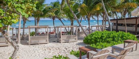 Private beach, white sand, free beach cabanas, sun loungers