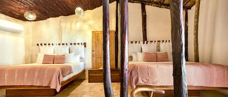 Premium bedding, down comforters, pillowtop beds, individually decorated