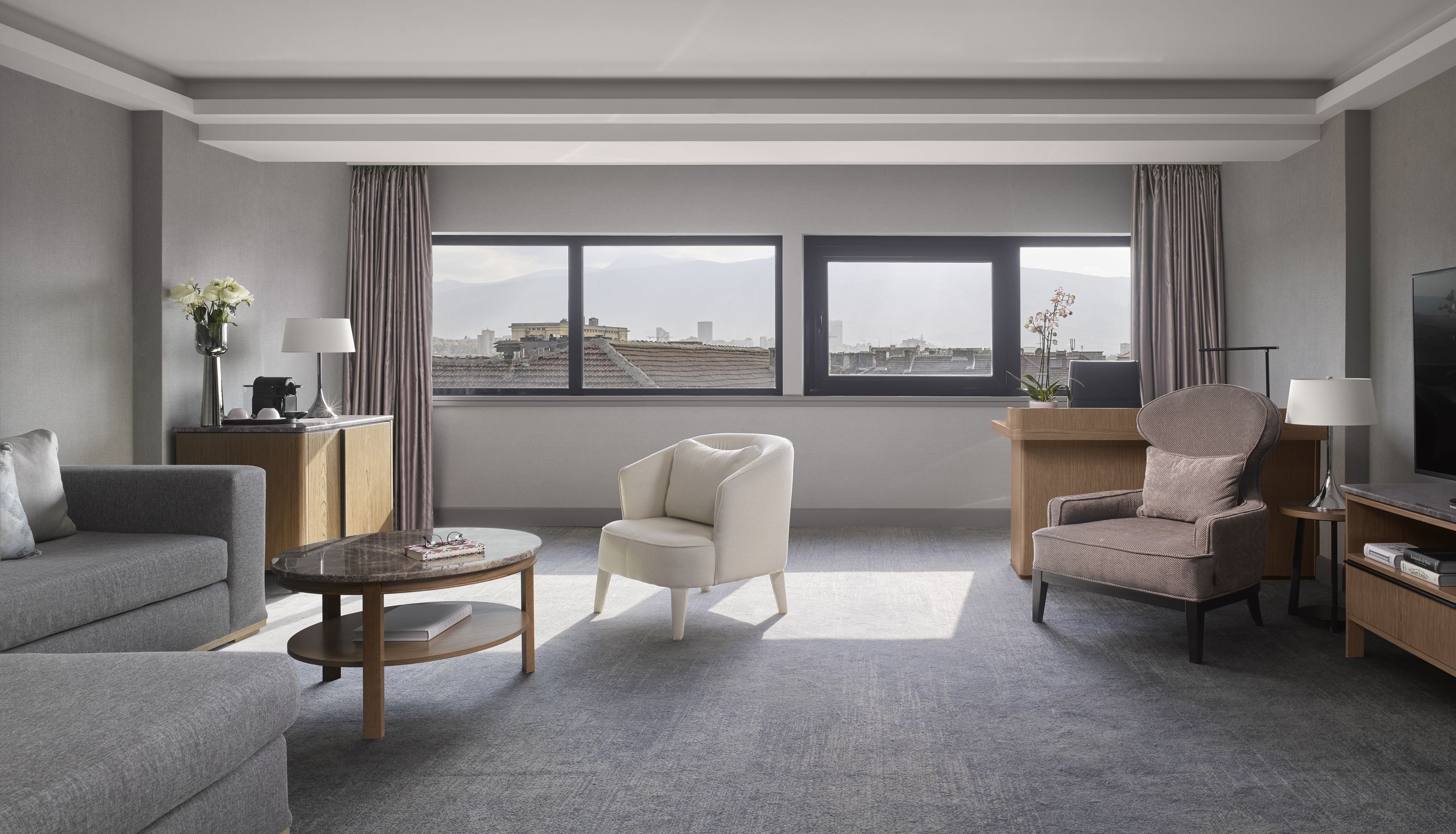 Premium bedding, down comforters, in-room safe, desk