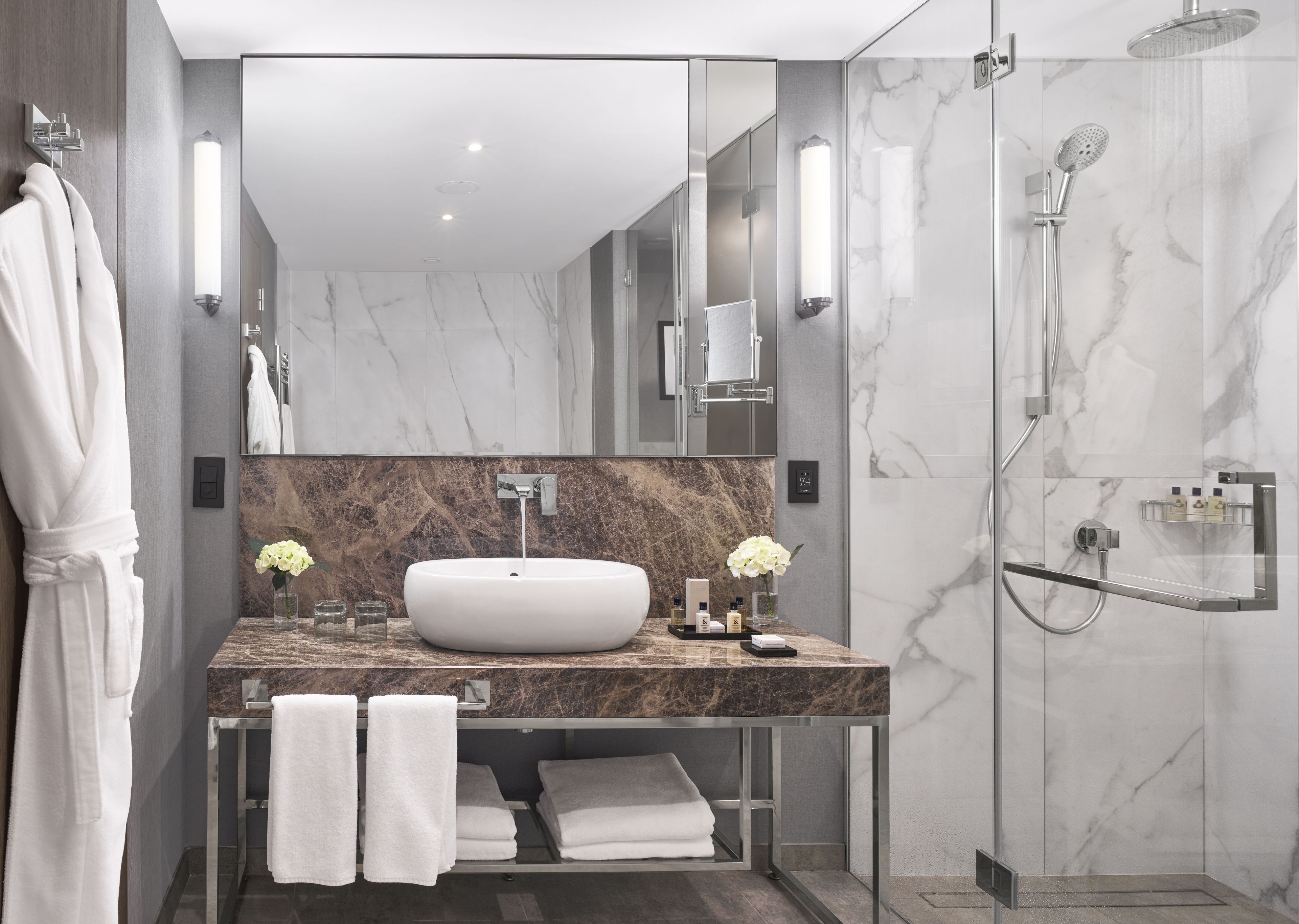 Separate tub and shower, rainfall showerhead, designer toiletries