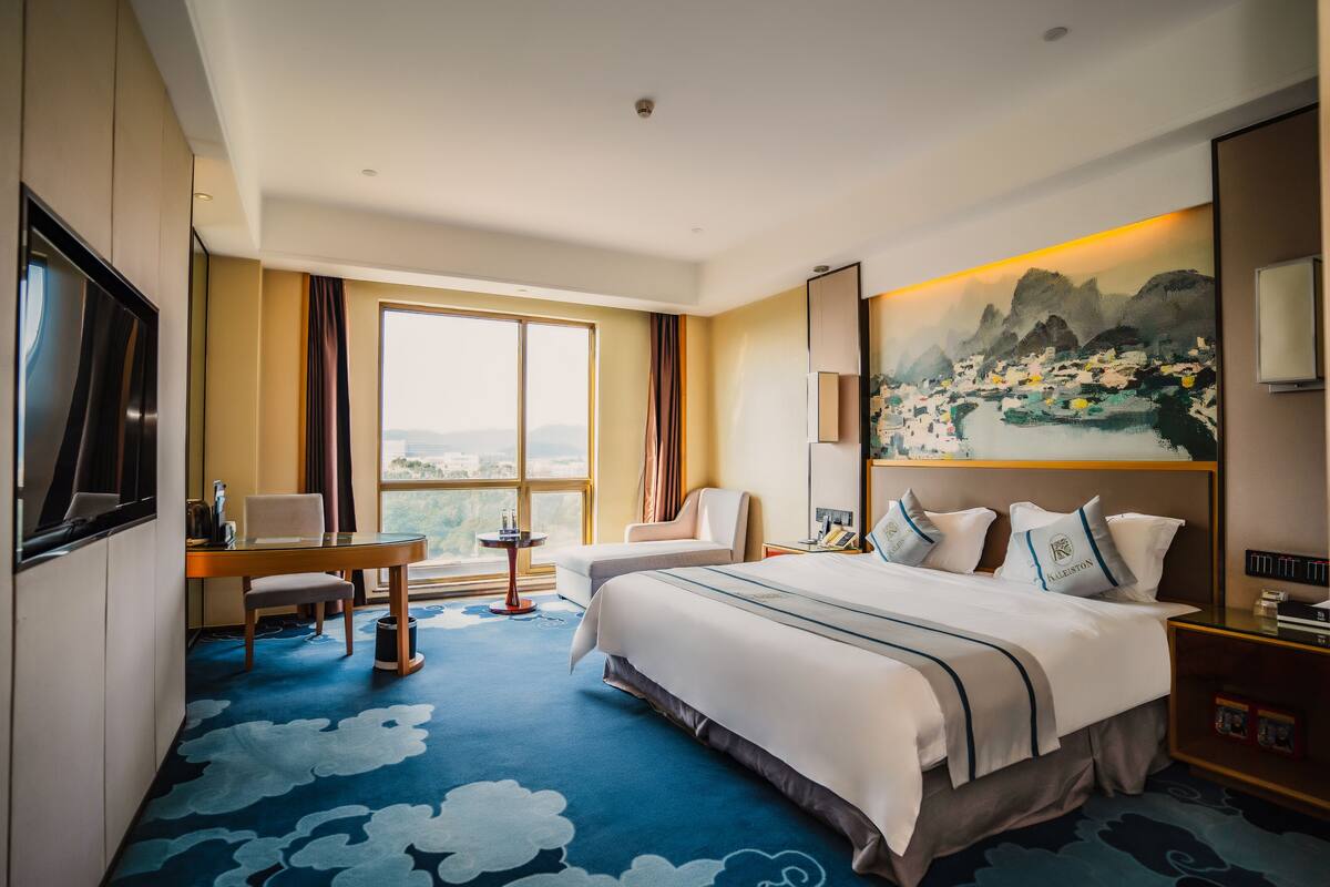 Free minibar items, in-room safe, desk, laptop workspace