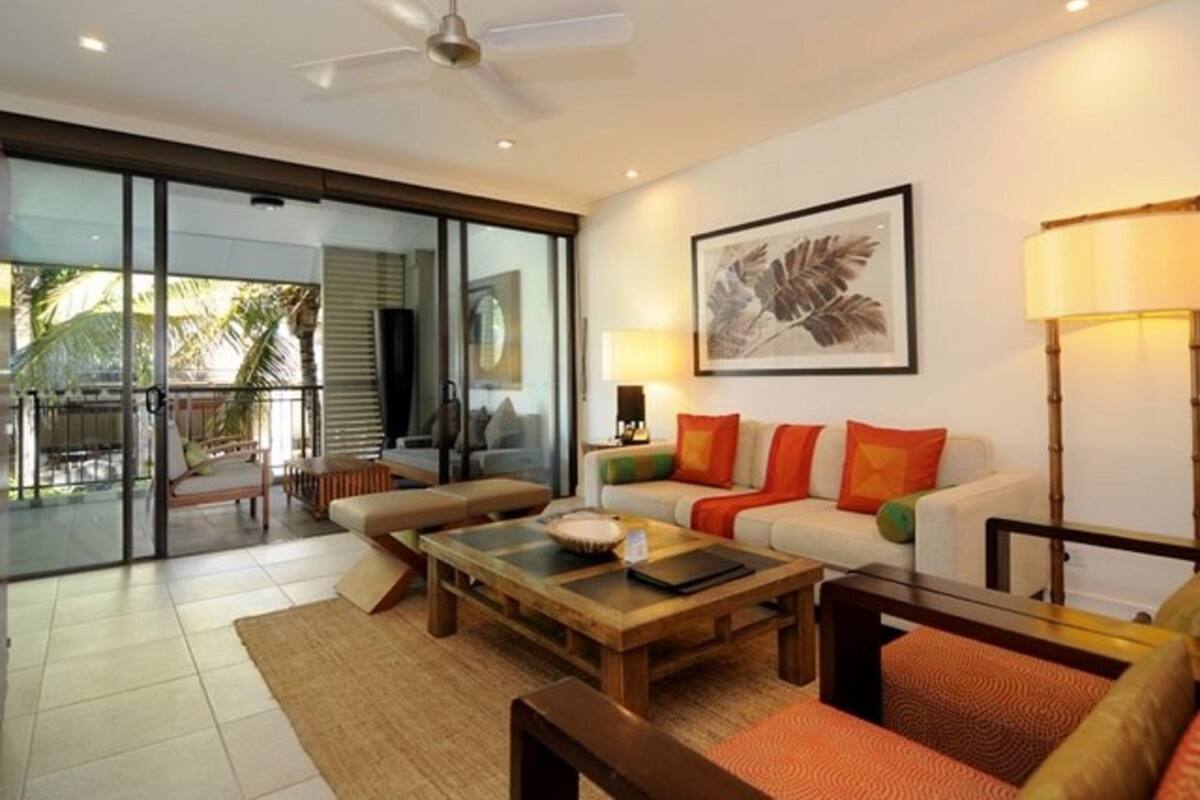 Luxury Penthouse Apartment, 3 Bedrooms, Pool View | Living area | 50-inch TV with satellite channels