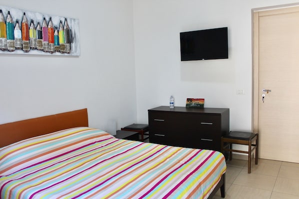 Desk, laptop workspace, blackout curtains, iron/ironing board