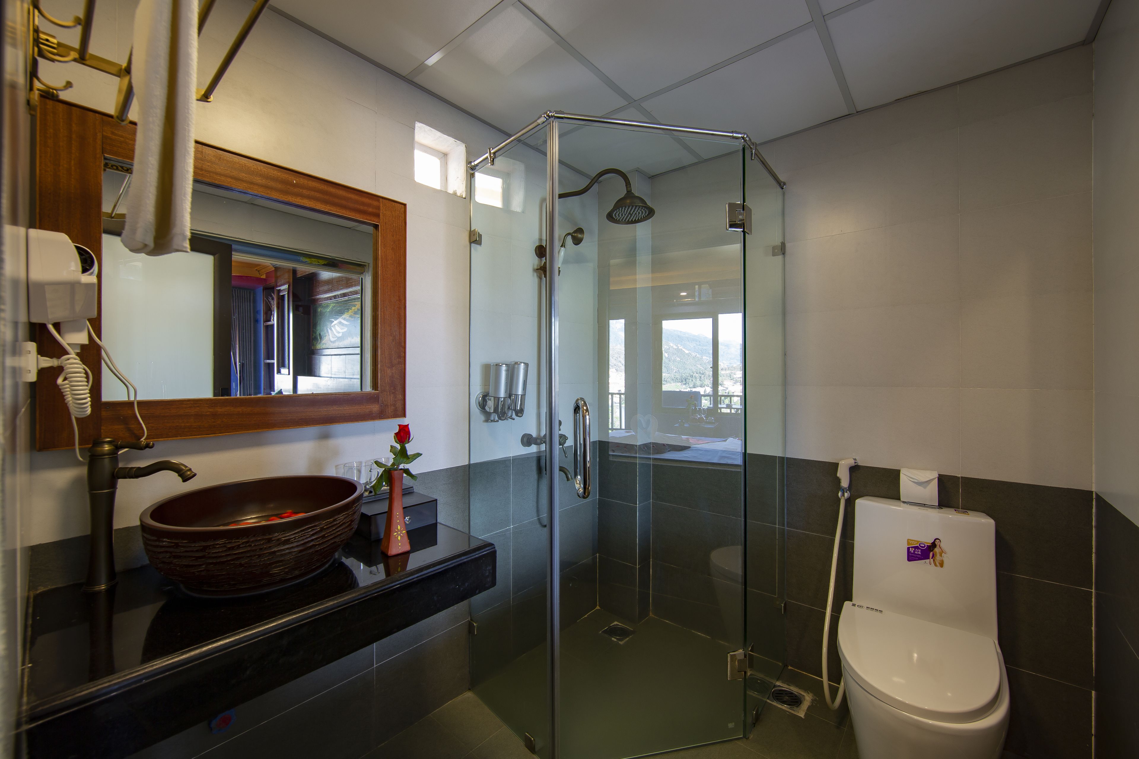 shower, free toiletries, hair dryer, slippers