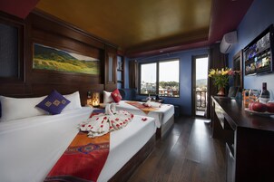 Premium bedding, down comforters, minibar, in-room safe