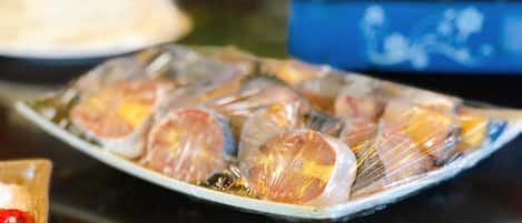 A plate of wrapped food items on a table.